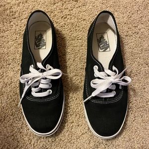 Black Vans lace up sneakers